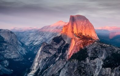 Half Dome in Yosemite National Park, California during sunset. The Half Dome made the list of best hiking trails in the U.S.