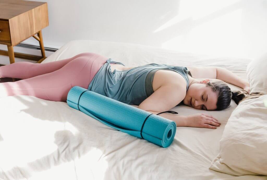 woman yoga mat sleep