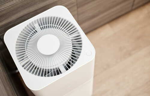 White home air purifier in the kitchen