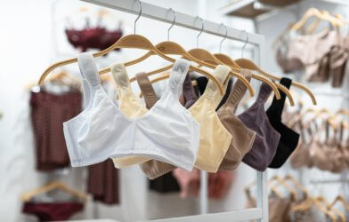 Bras on hangers at a clothing store