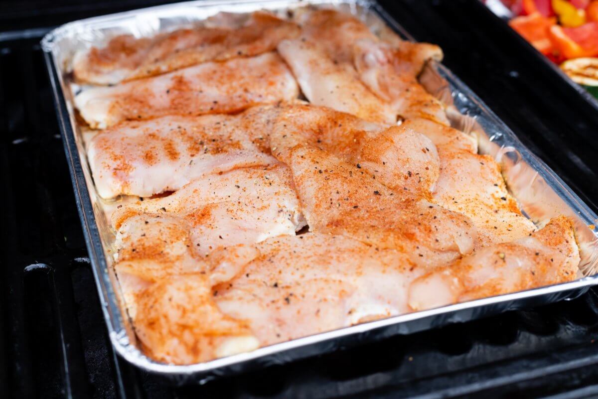 Chicken breast prepared for cooking in the oven
