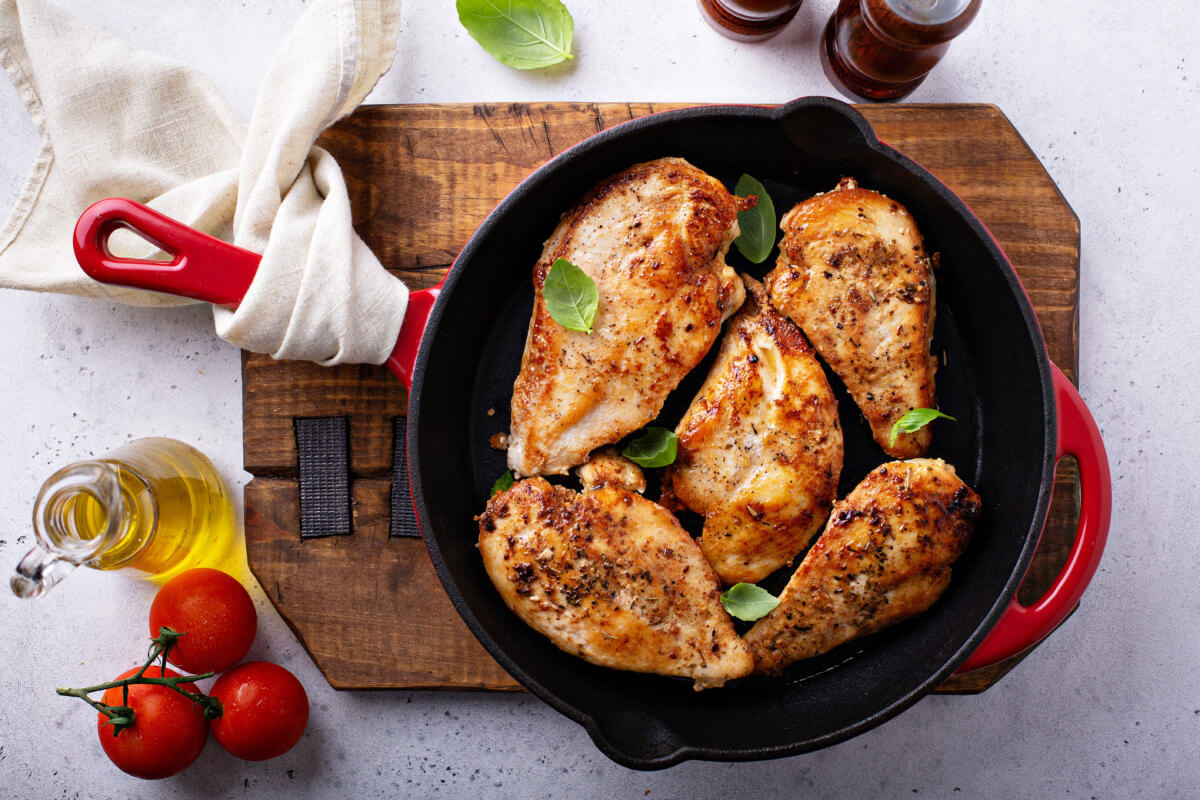 Cooked chicken breast in a cast iron skillet