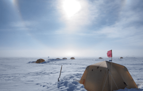 A research camp on the Antarctic ice sheet during daytime