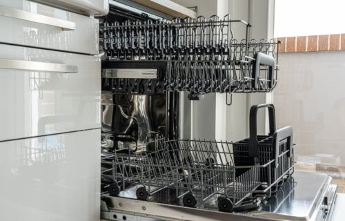 Open dishwasher with rack