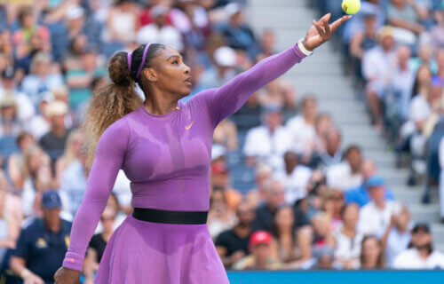 Women's tennis legend Serena Williams serves a ball at the 2019 U.S. Open