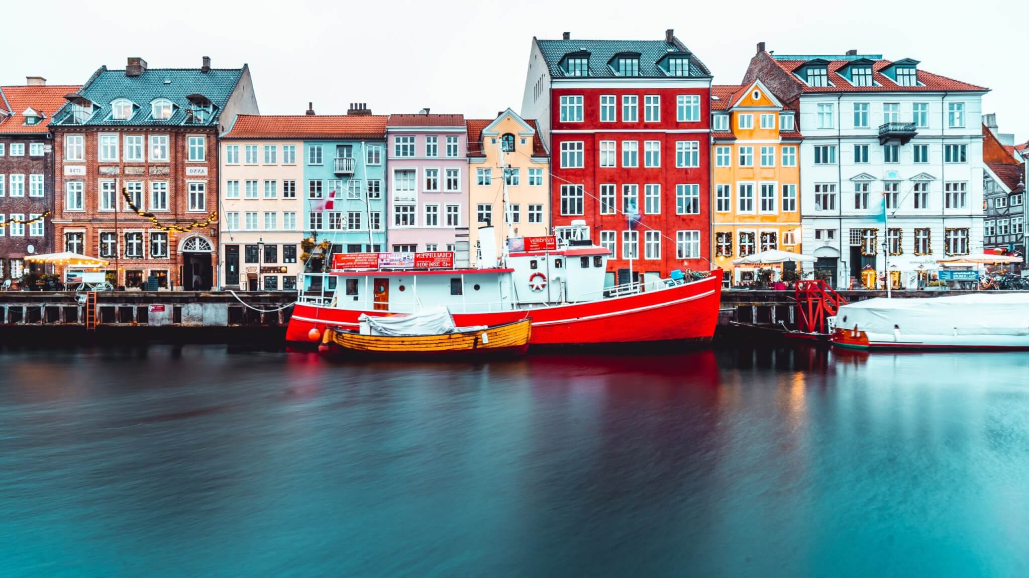 Colorful houses along the water in Copenhagen, Denmark