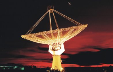 A radio telescope at night