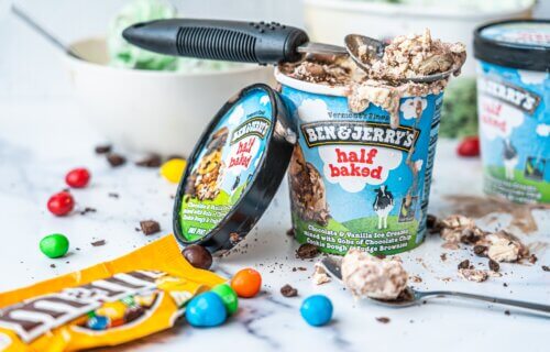 Ben and Jerry's ice cream with a scooper and m&m's