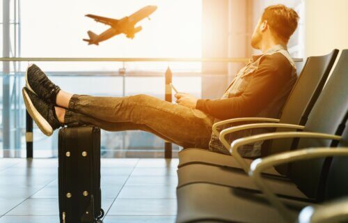 a man waiting for an airplane