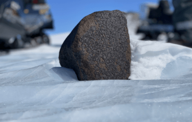 Meteorite sitting in the snow