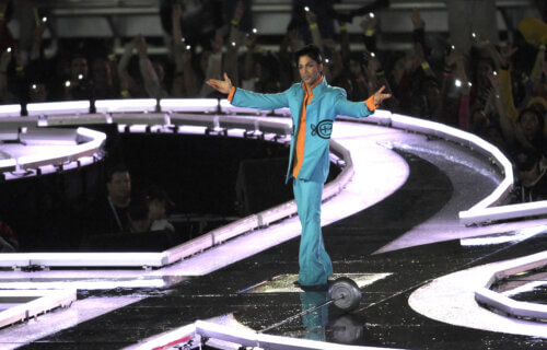 Prince gestures as he performs during half-time for Super Bowl XLI between the Chicago Bears and the Indianapolis Colts at Dolphin Stadium on February 4, 2007 in Miami.