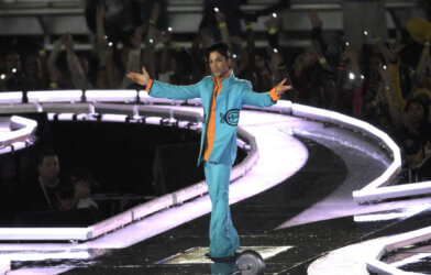 Prince gestures as he performs during half-time for Super Bowl XLI between the Chicago Bears and the Indianapolis Colts at Dolphin Stadium on February 4, 2007 in Miami.