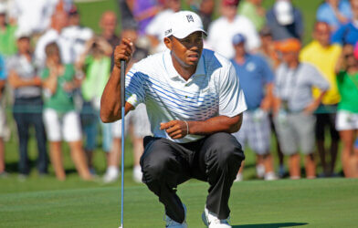 Tiger Woods measures a putt at Atunyote golf course, Turning Stone Resorts in August 2012.