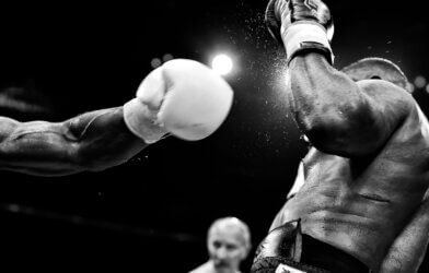Black and white image of two boxers during a bout