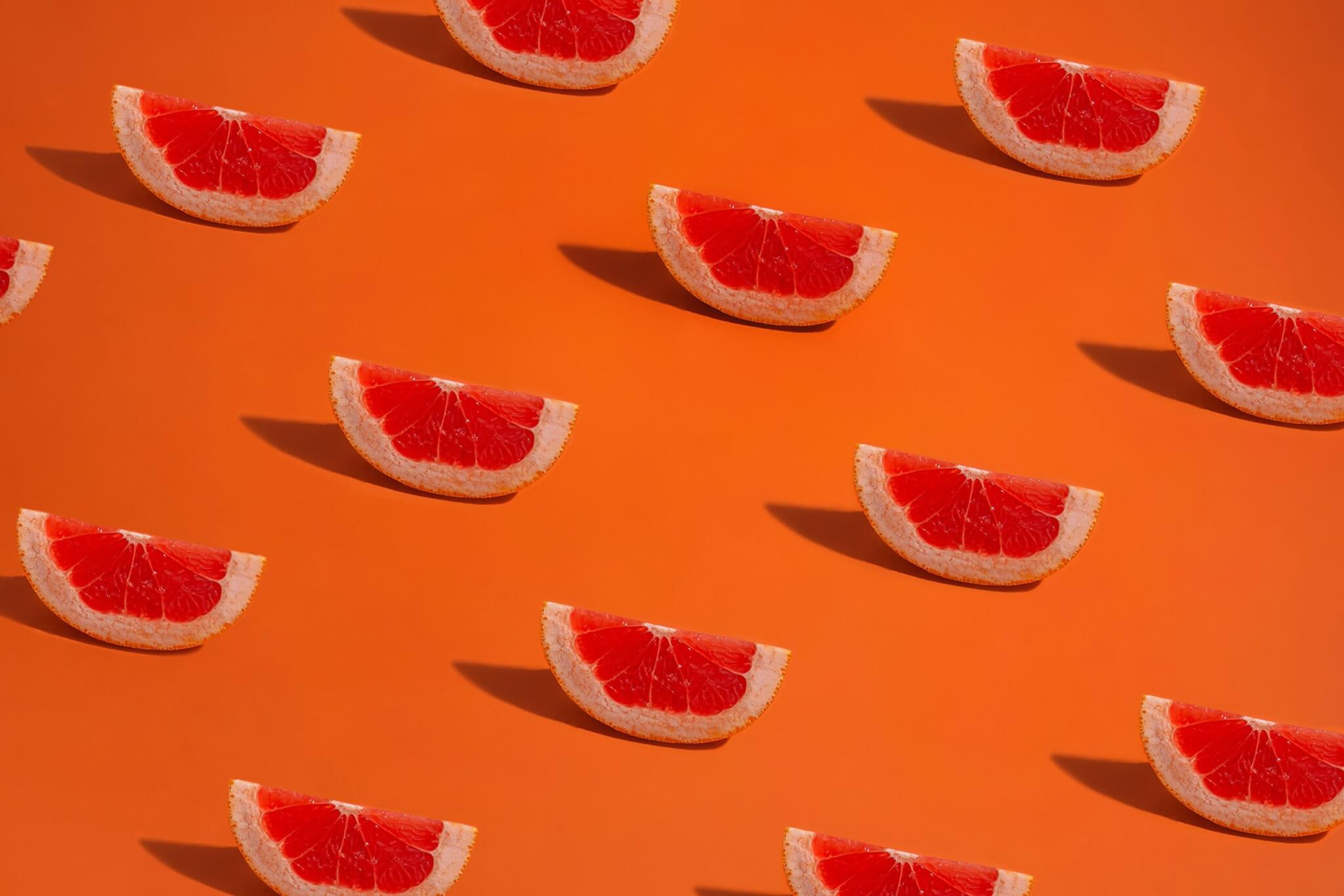 grapefruits on an orange background