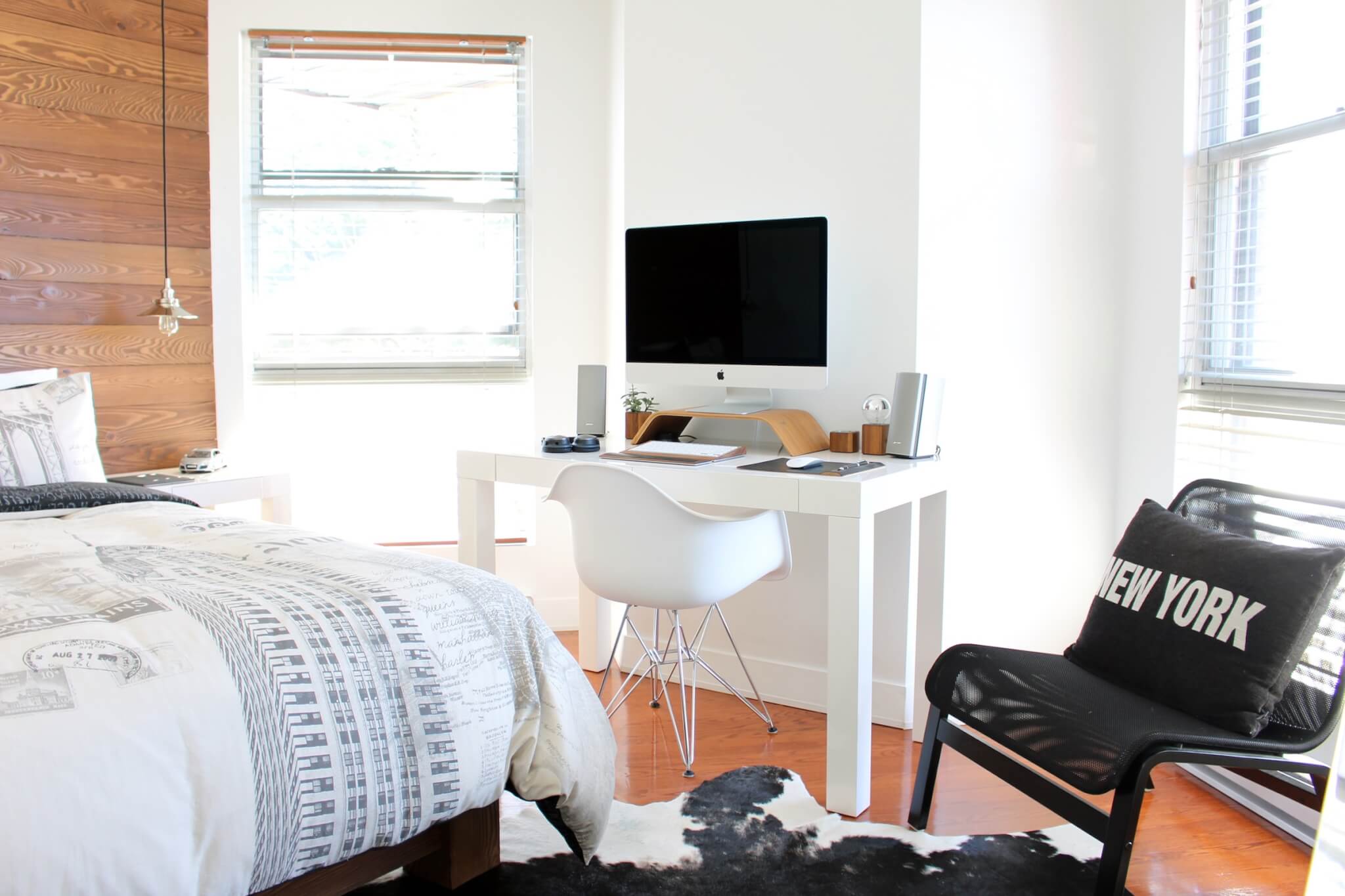 white office chair at desk in bedroom