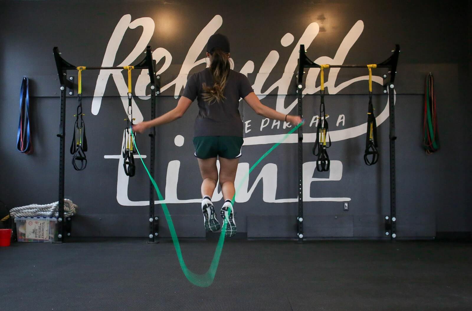 Woman using jumping rope for workout