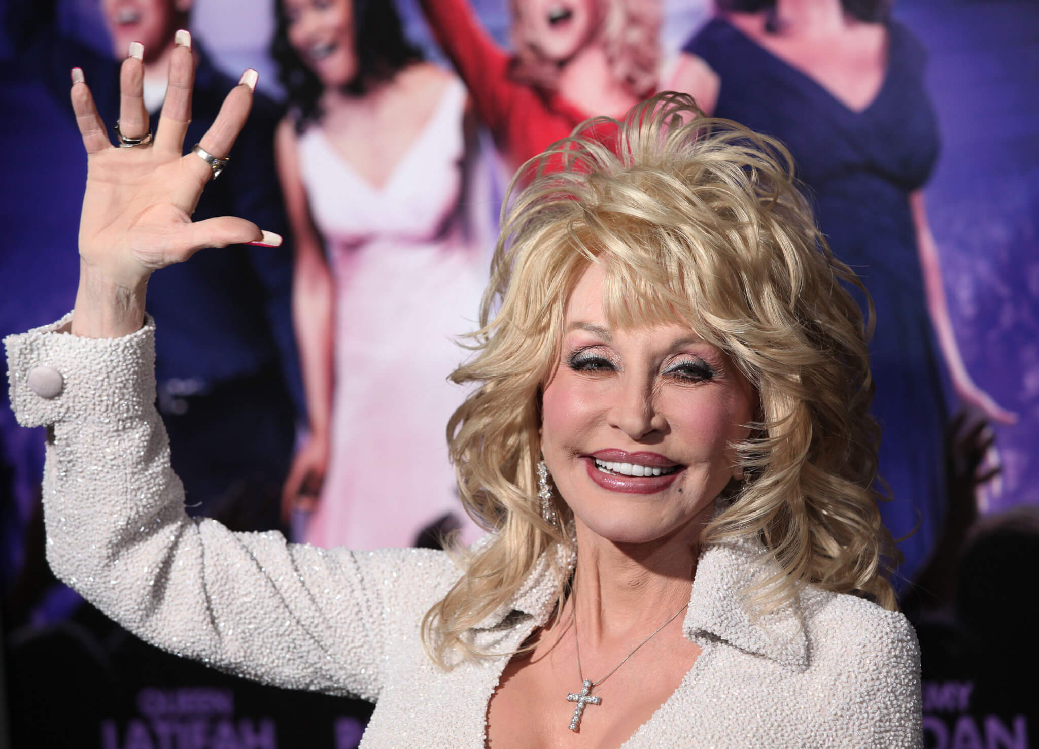Dolly Parton waves to fans