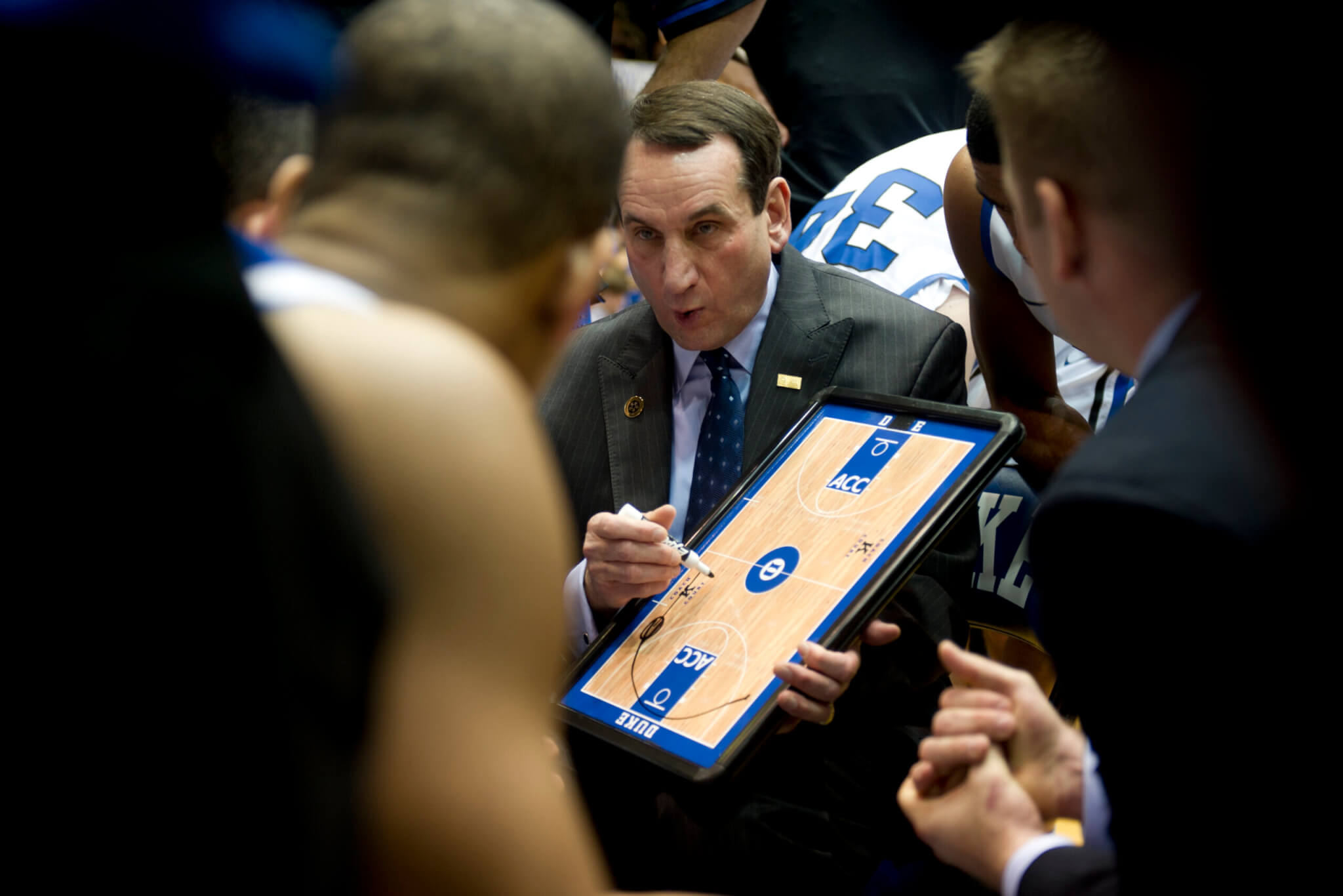 Duke University head coach Mike Krzyzewski talks to his team