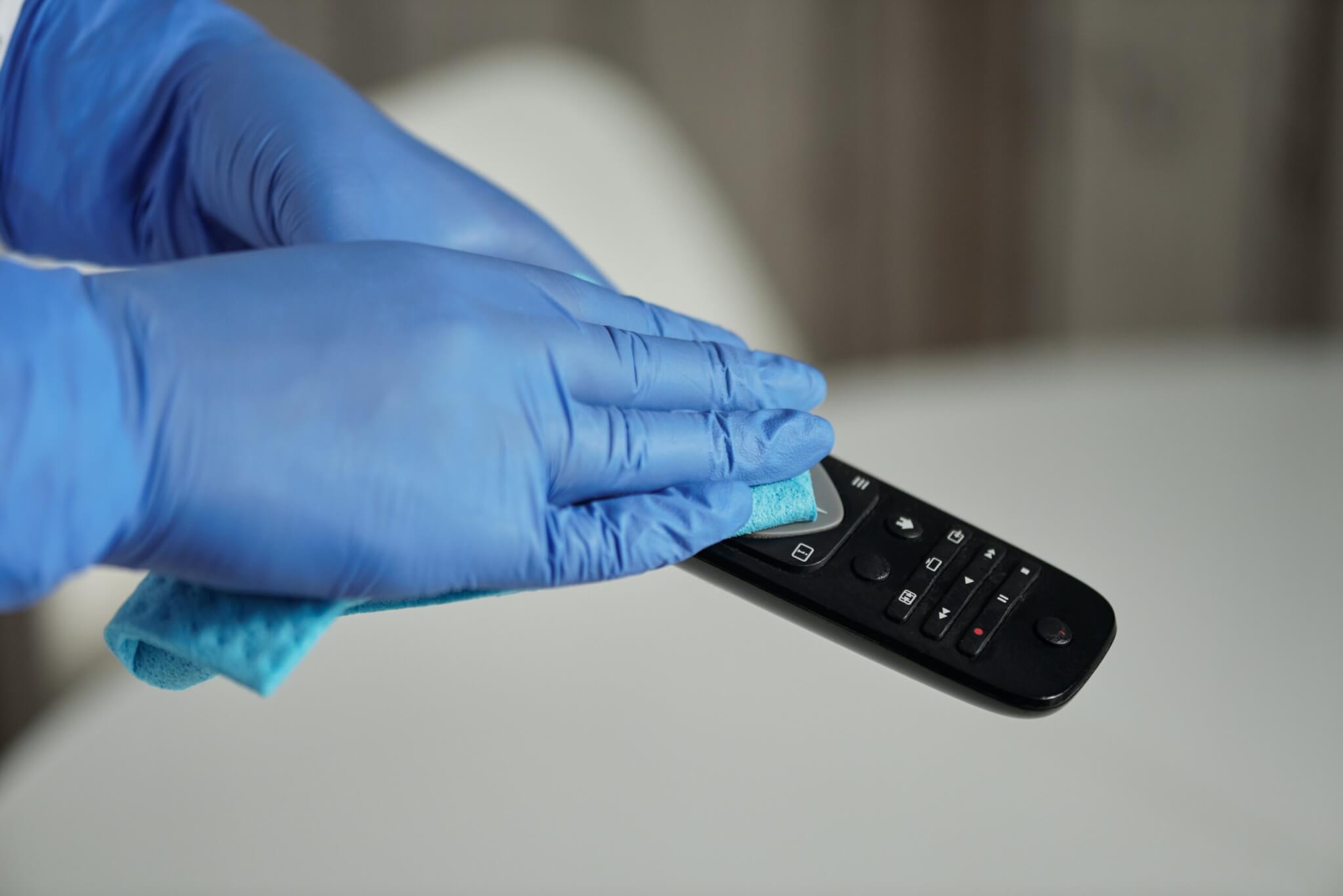 Remote control being cleaned