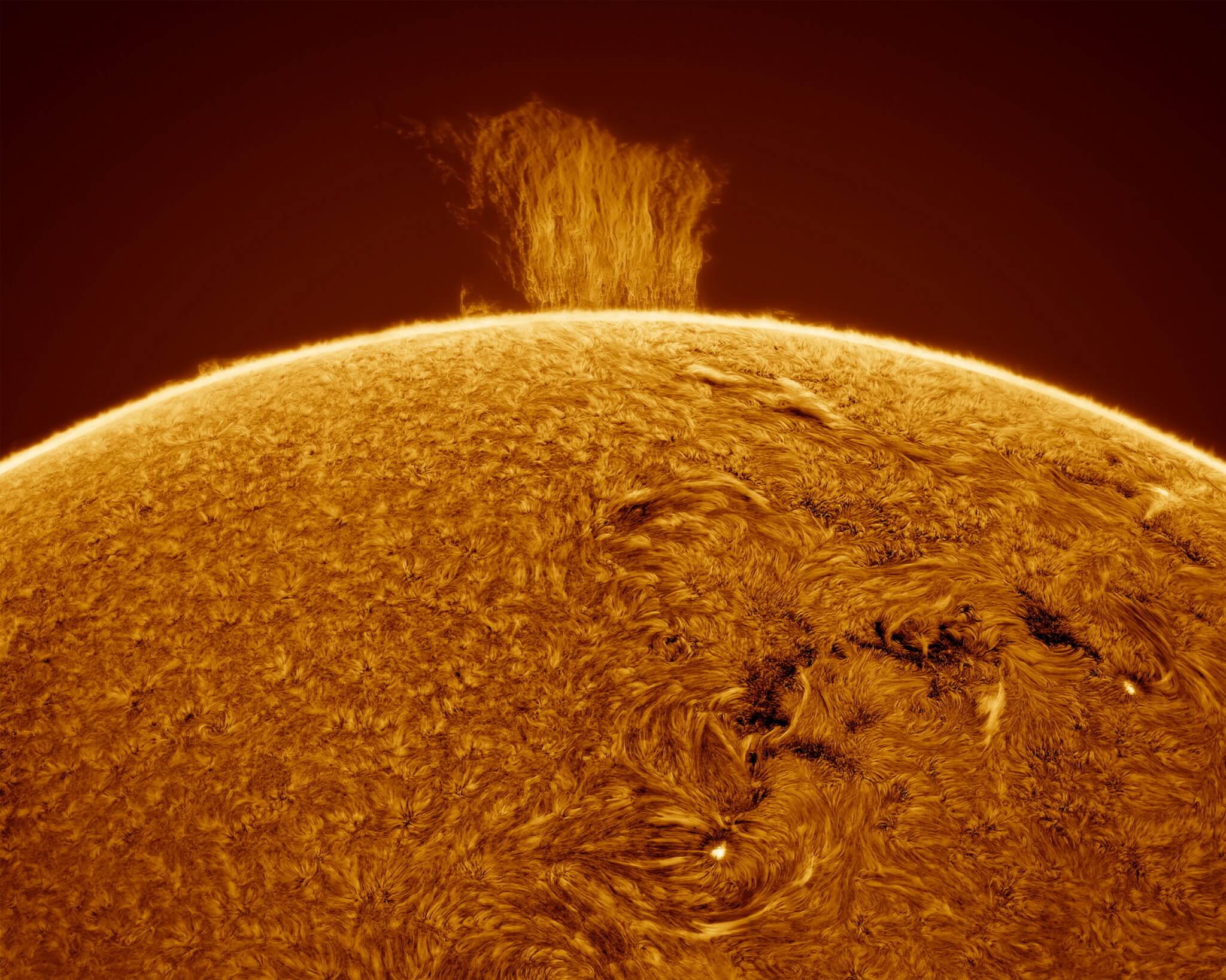 "Wall" of plasma seen stretching above the Sun's surface.