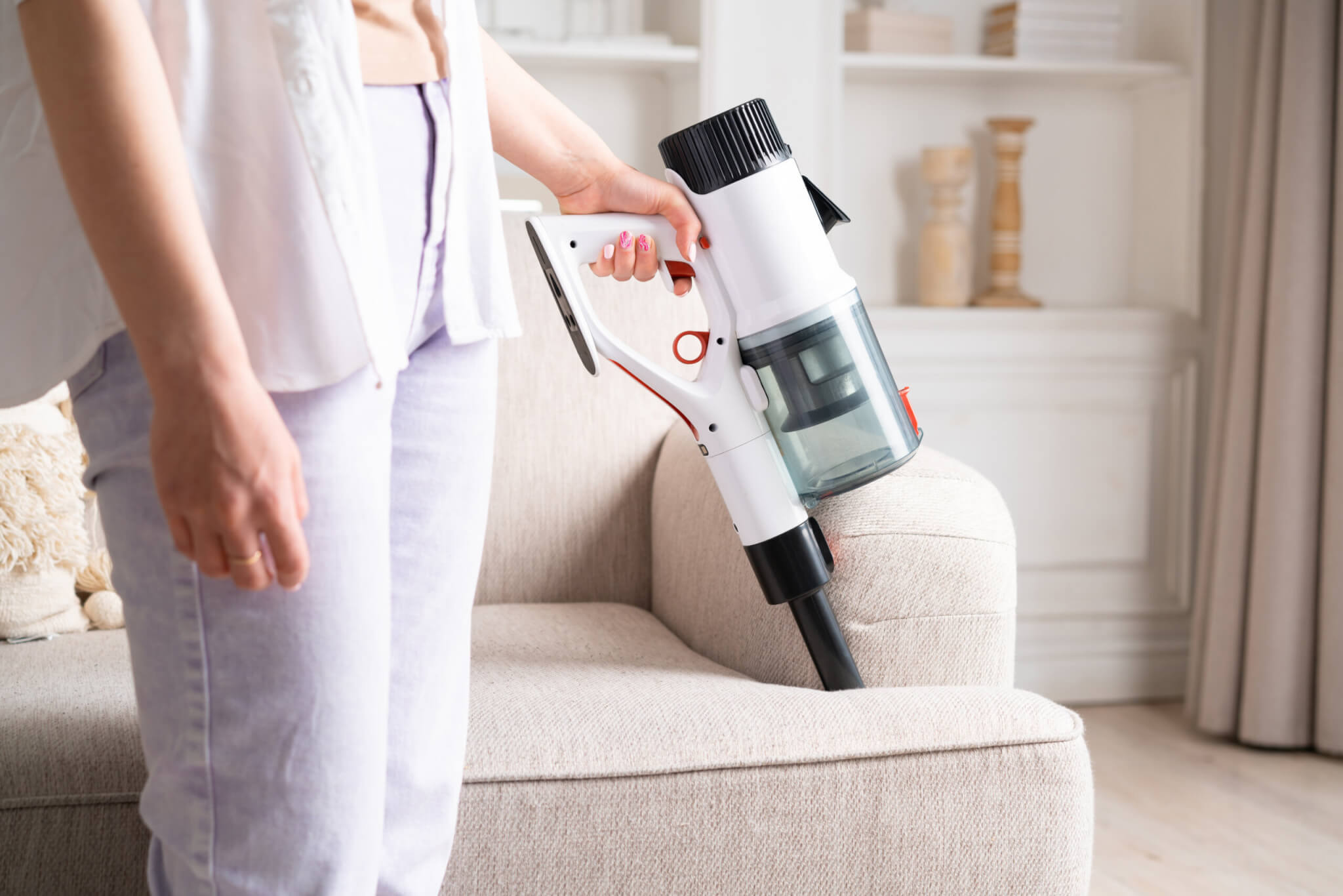 https://studyfinds.org/wp-content/uploads/2023/03/Woman-using-handheld-vacuum-scaled.jpeg