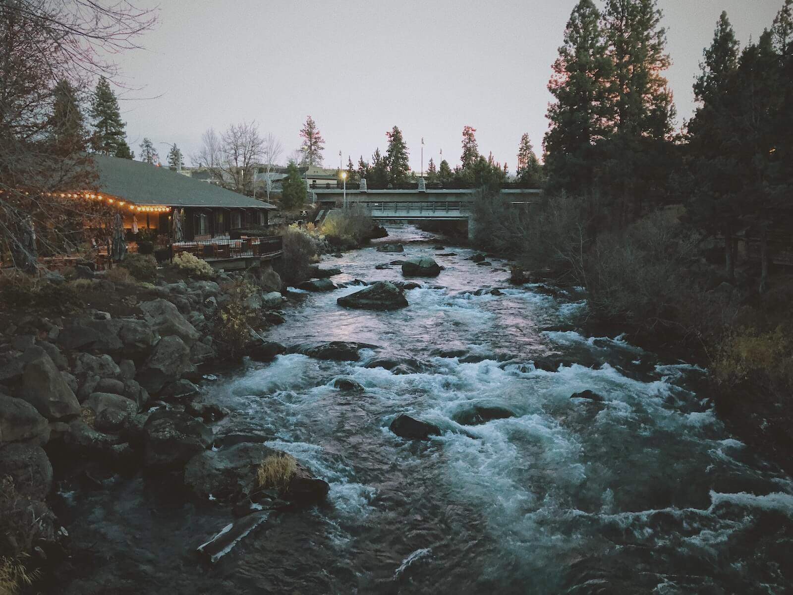 A lodge alongside a roaring river in Bend, Oregon