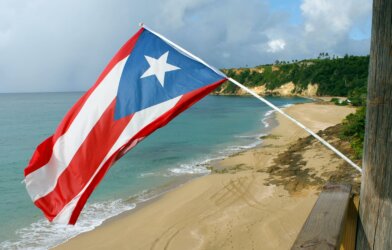 The Puerto Rico flag flying above a beach