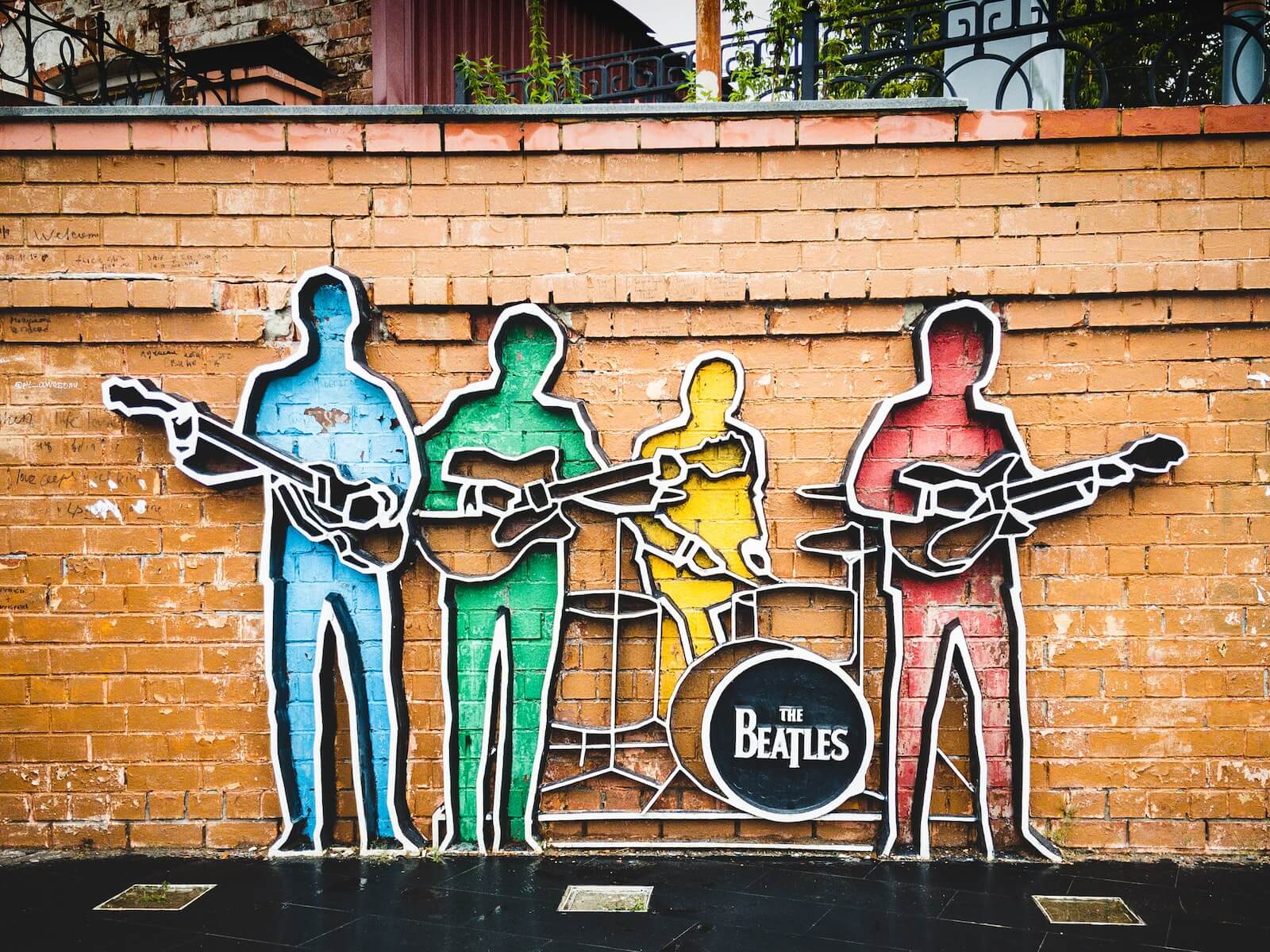 The Beatles tribute artwork on wall