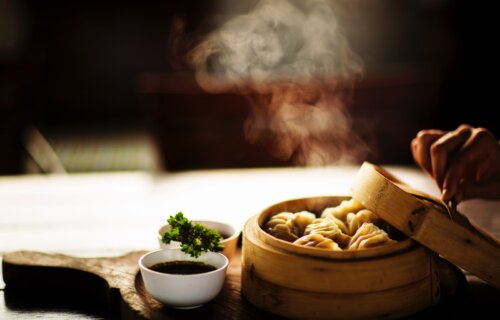 Chinese food dinner: Steamed Dim Sum dumplings on steamer