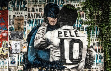 Batman and Pele hugging artwork
