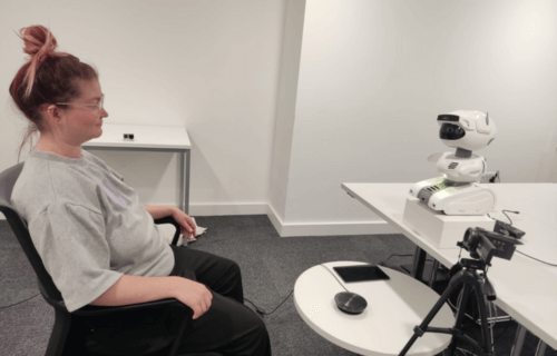 Researchers from the University of Cambridge carried out a study in a tech consultancy firm using two different robot wellbeing coaches, where 26 employees participated in weekly robot-led wellbeing sessions for four weeks. Although the robots had identical voices, facial expressions, and scripts for the sessions, the robots’ physical appearance affected how participants interacted with it. CREDIT: University of Cambridge