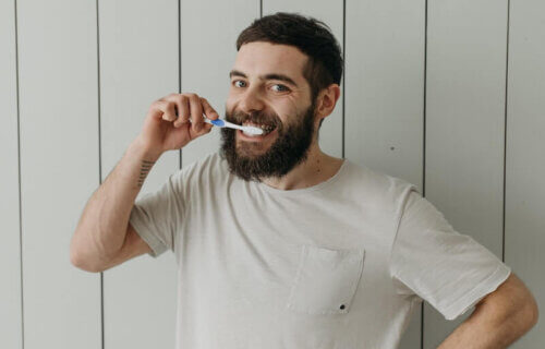 A Man Brushing His Teeth