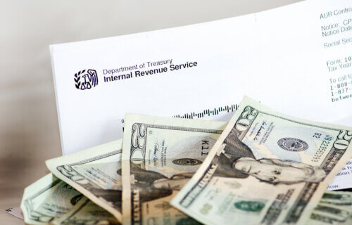IRS Taxes Letter with Cash