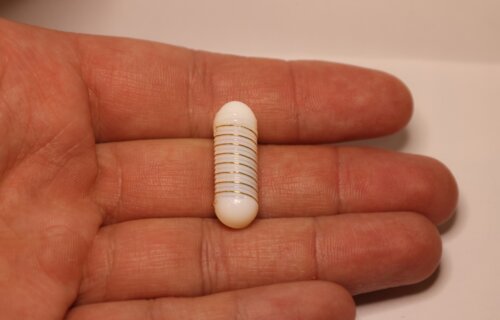 An ingestible capsule that delivers an electrical current can stimulate the release of hormones.