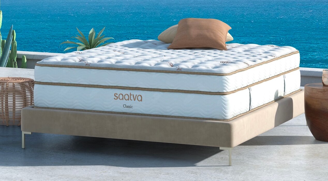 white mattress by the ocean