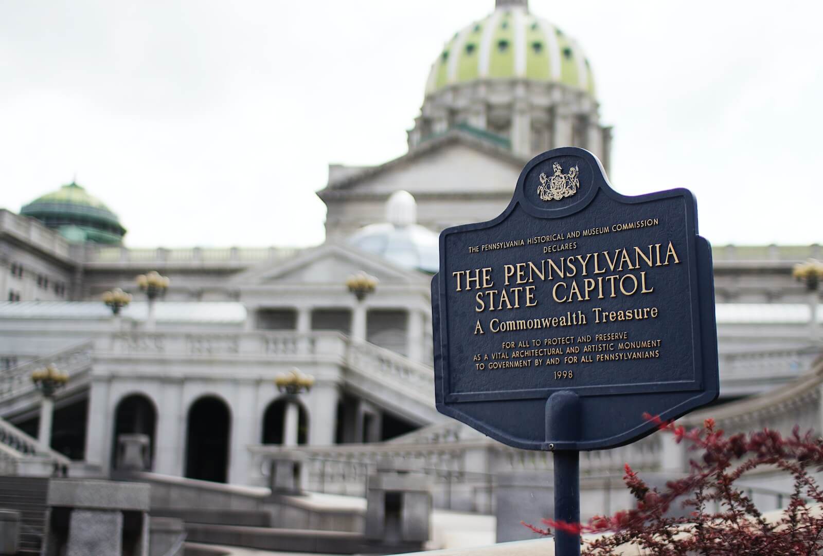 The Pennsylvania State Capitol signage and building in Harrisburg
