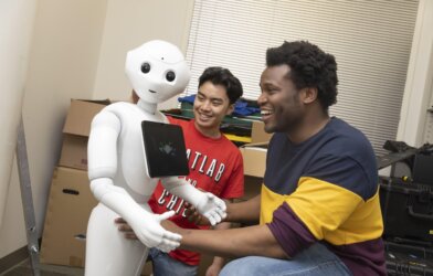 A robot with 2 GIT students