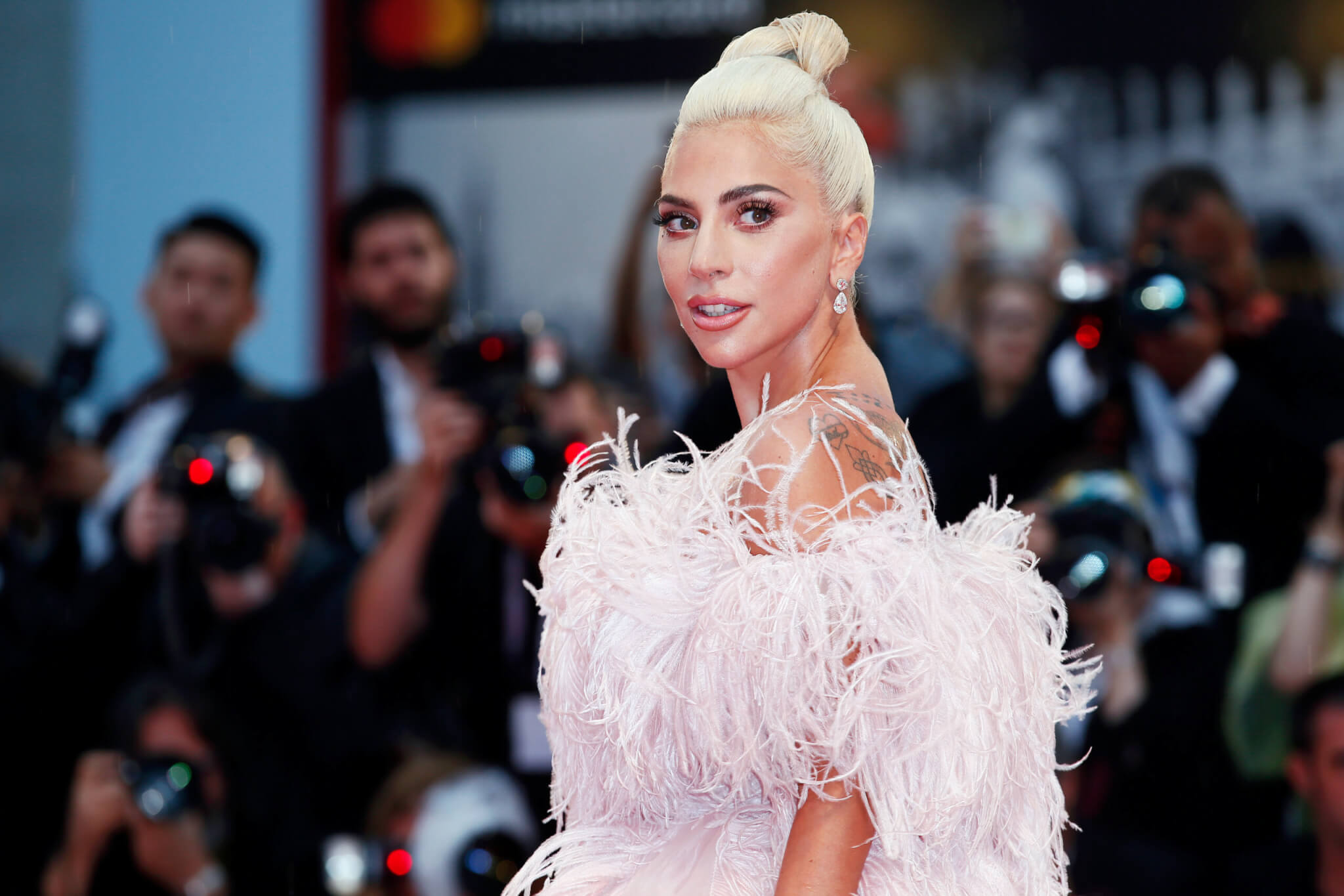 Lady Gaga on the carpet premiering "A Star is Born" in 2018