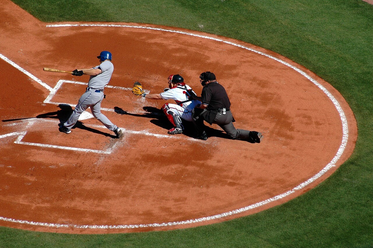 image of baseball player hitting a home run