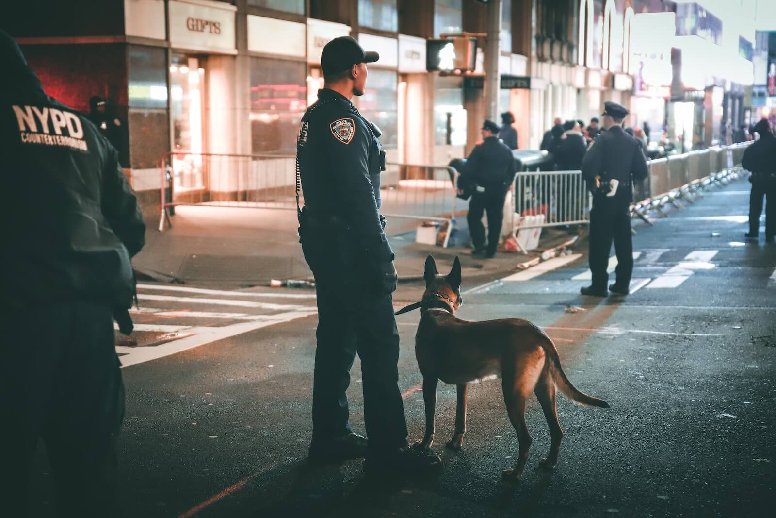 NYPD officers on patrol at night