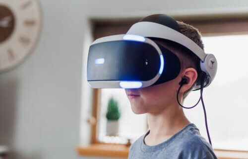 A boy wearing a VR headset