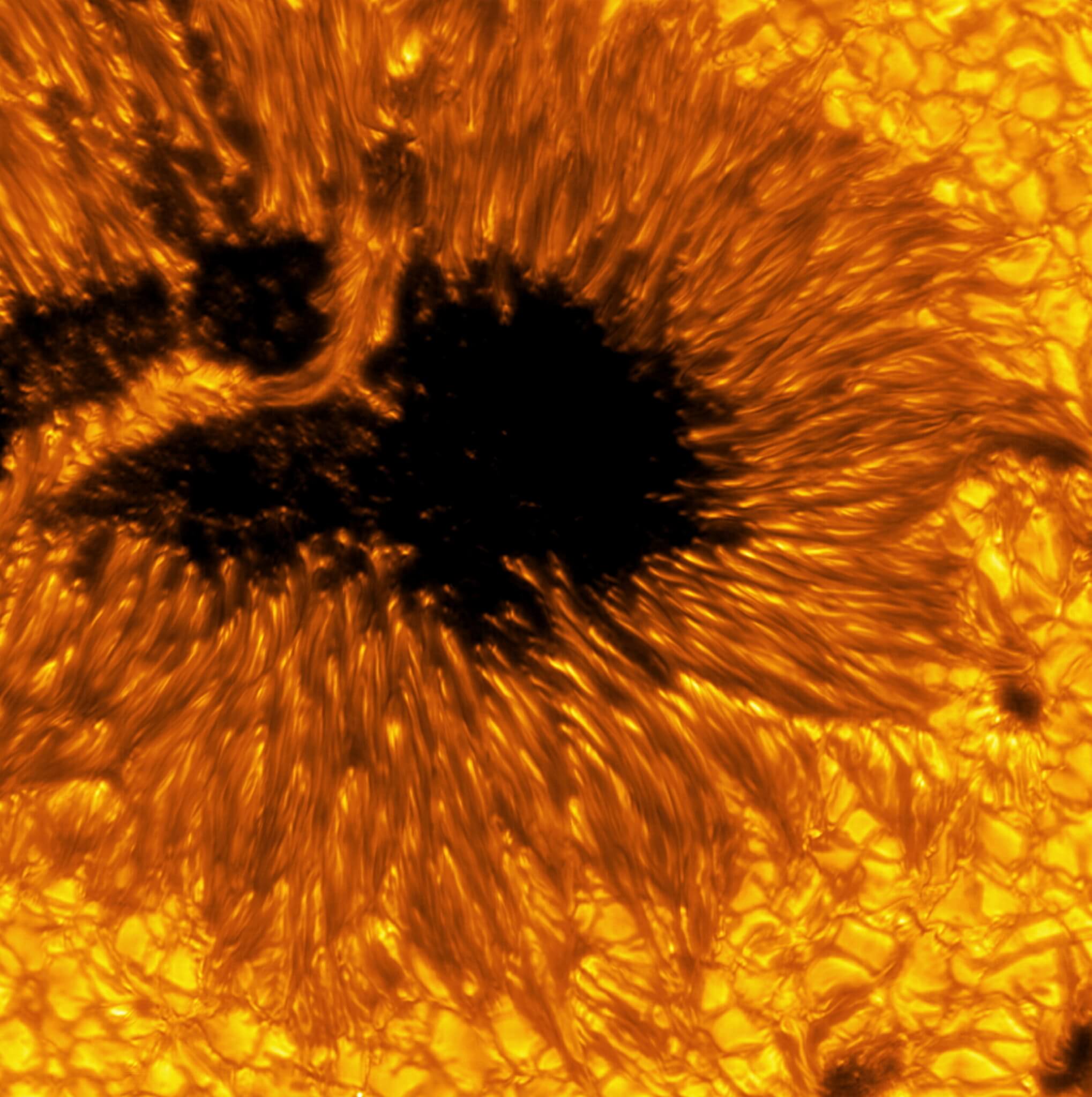 A detailed example of a light bridge crossing a sunspot’s umbra.
