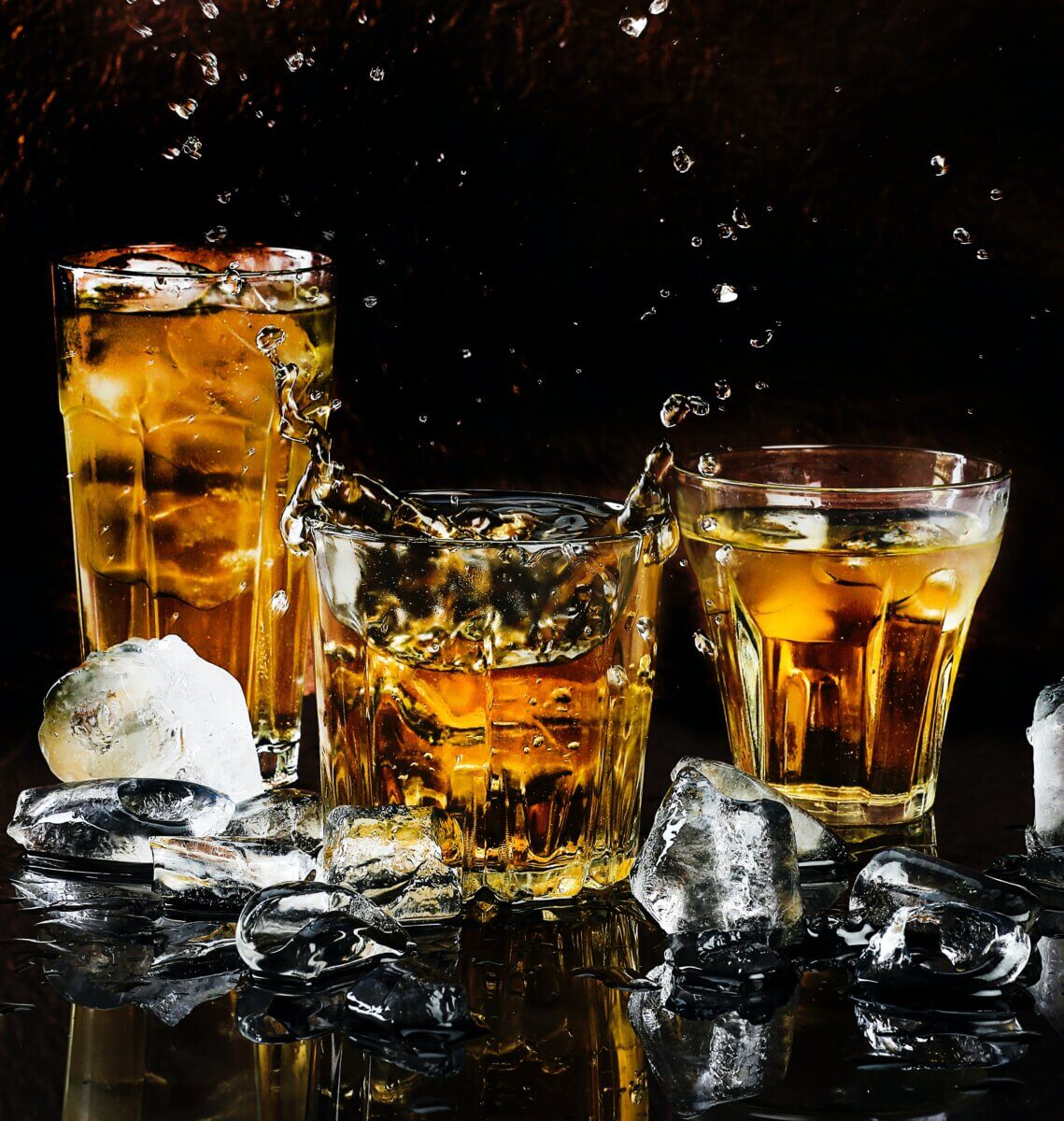 glasses of whisky with ice