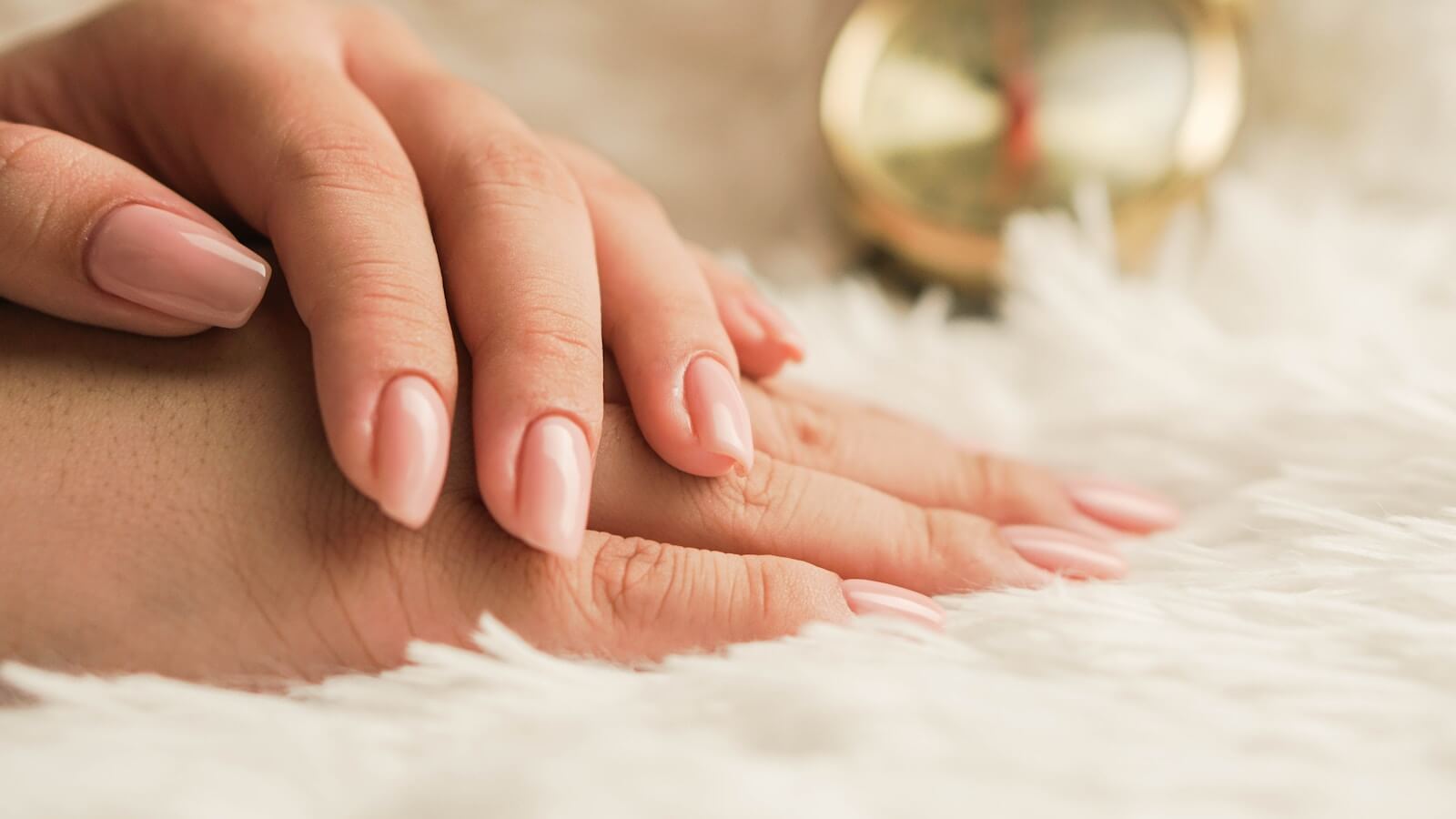 A woman's manicured hands