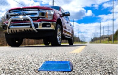 Researchers have enabled standard raised pavement markers to transmit GPS information that helps autonomous driving features function better in remote areas or in bad weather.