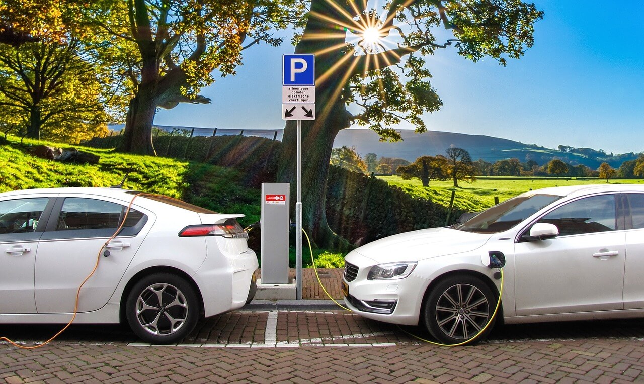 Picture of two electric cars charging.