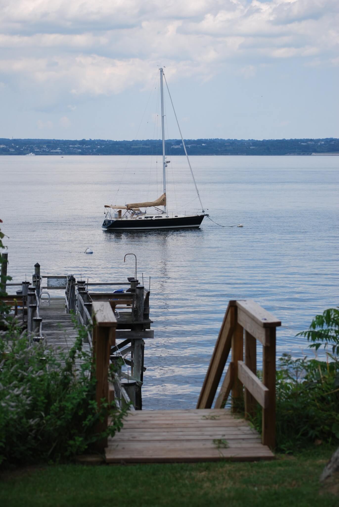 A sailboat and dock in Jamestown, RI