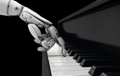 robot hand plays piano