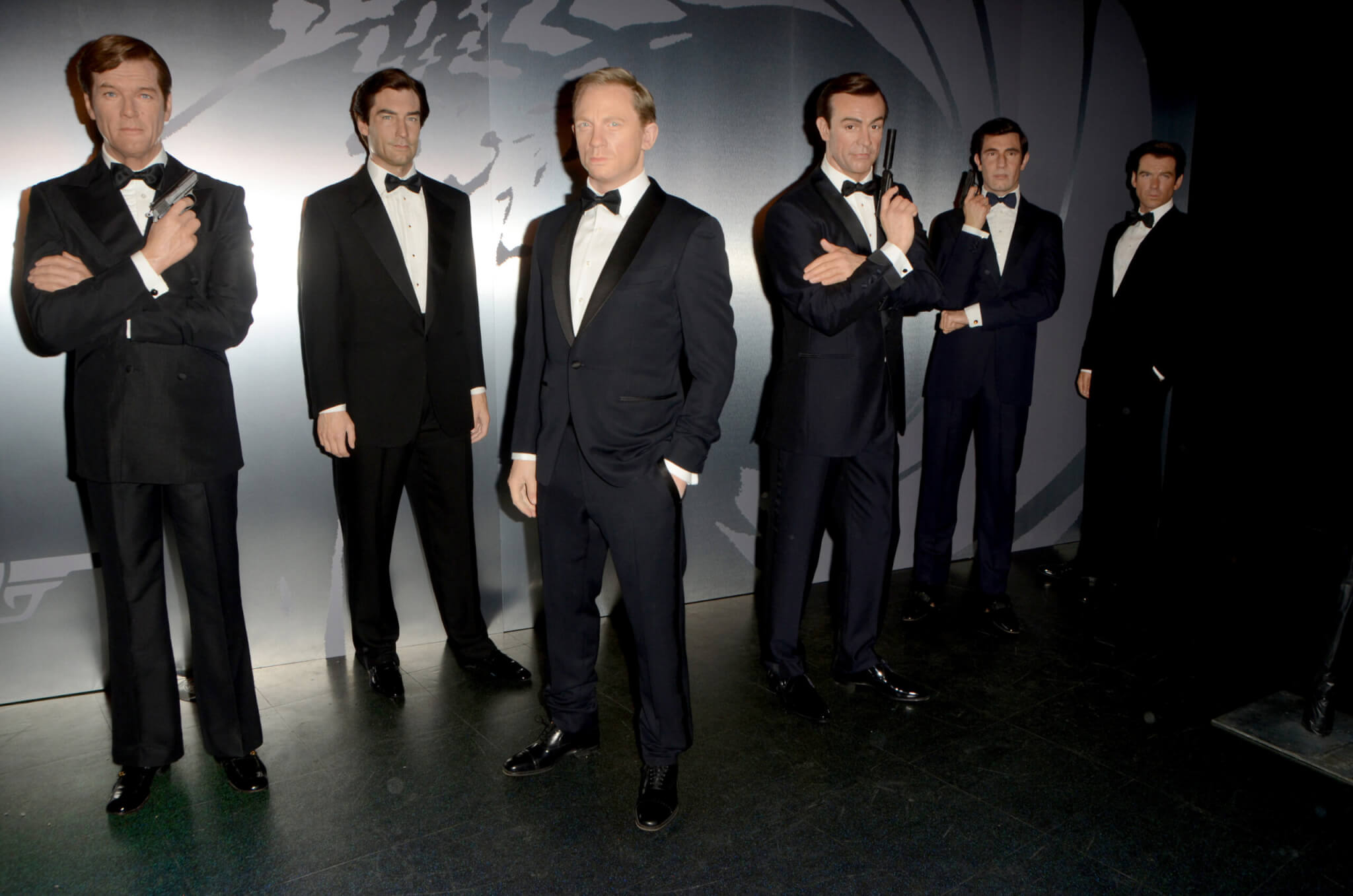 Wax figures of Six Bond actors at the Madame Tussauds Hollywood